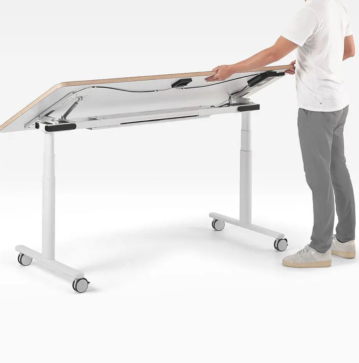 Person adjusting a white adjustable table on a white background