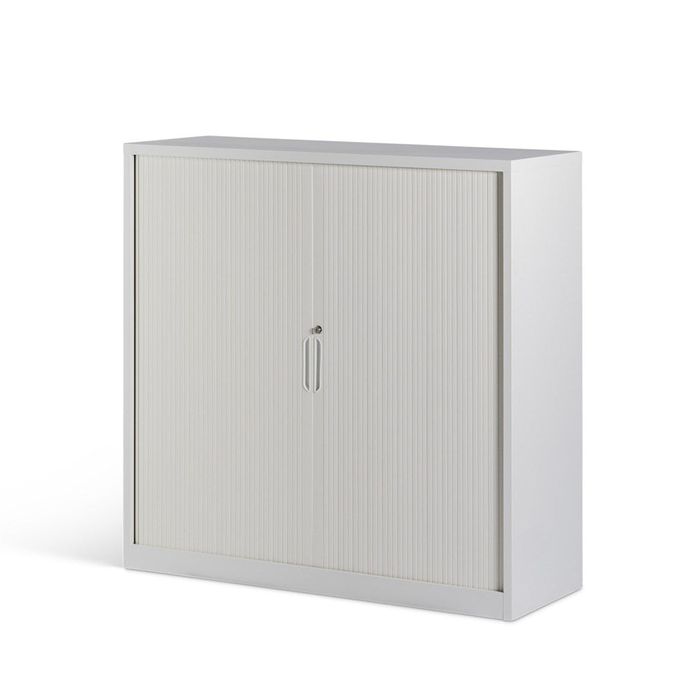 White storage cabinet with a sliding door on a white background