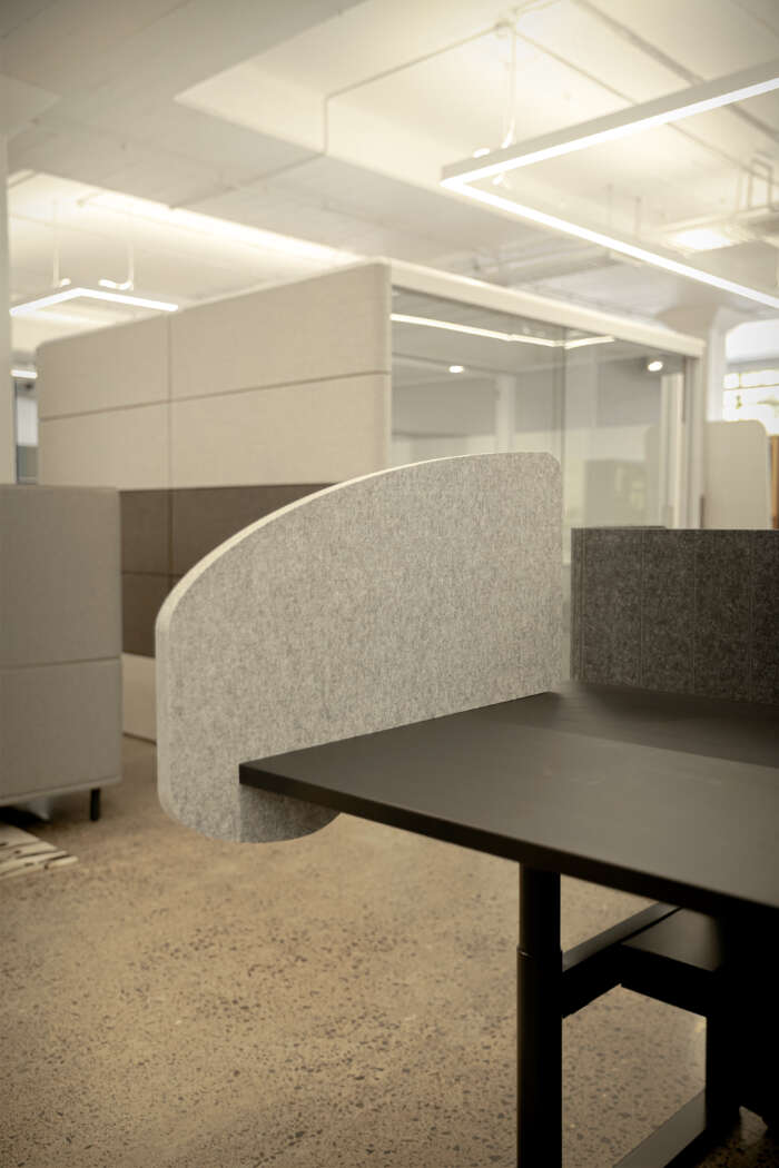 Slide Desk Panel positioned on edge of desk